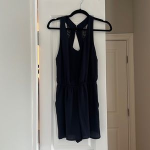 H&M navy romper with lace detail in back!